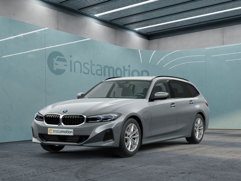 Grau Gebraucht 2022 BMW 320e Kombi | 31.550 € - Bild 1/4