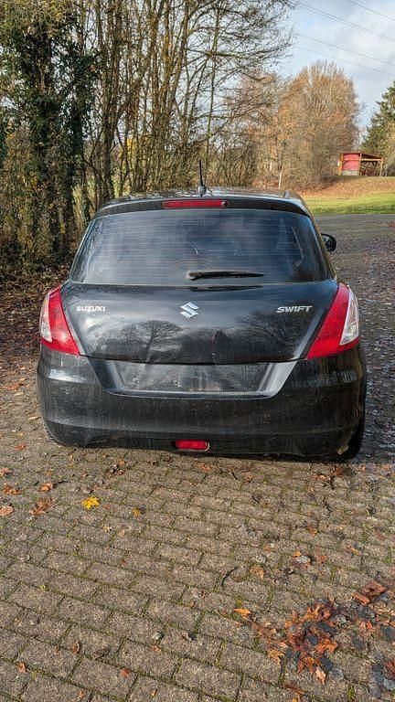 Gebraucht Suzuki Swift 94 PS (69 kW) 2013 Schwarz Kleinwagen