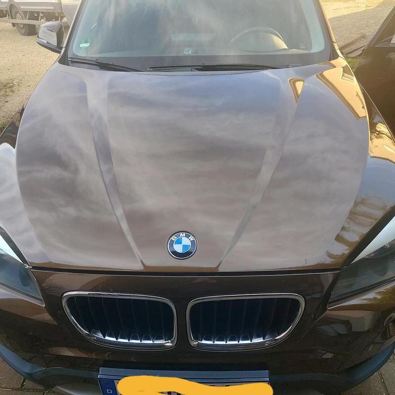 Braun Gebraucht 2012 BMW X1 SUV | 8.999 € (Teuer) - Bild 1/4