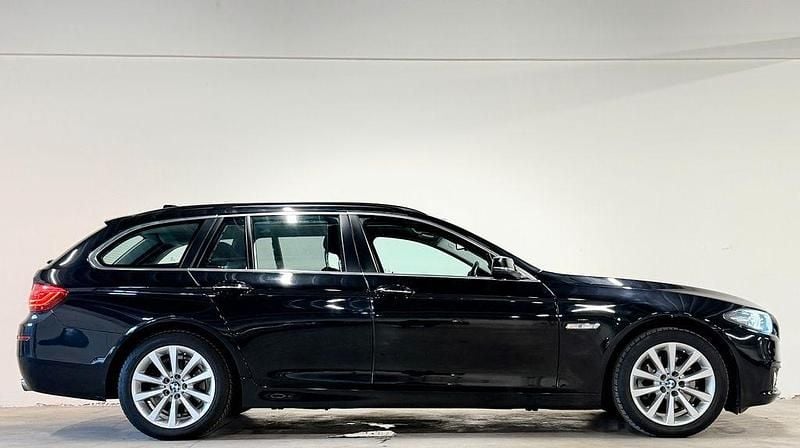 Second-hand BMW 520 Luxury Line 190 CP (139 kW) 2015 Negru Berlinǎ