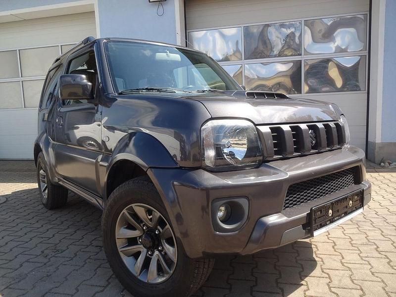 Grau Gebraucht 2015 Suzuki Jimny Club SUV | 14.850 € (Fairer Preis) - Bild 1/4