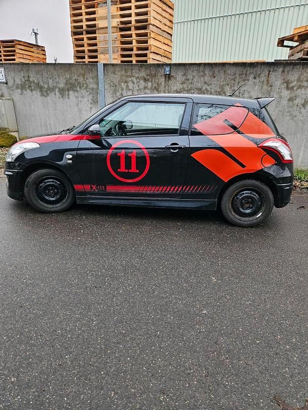 Gebraucht Suzuki Swift 94 PS (69 kW) 2011 Schwarz Kleinwagen