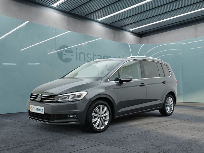 Grau Gebraucht 2024 VW Touran Highline Van / Kleinbus | 36.749 € (Etwas zu teuer) - Bild 1/3