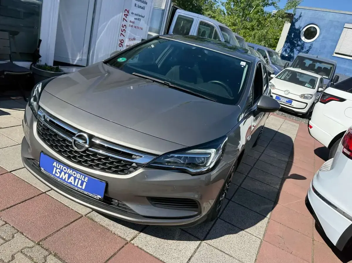 Gebraucht Opel Astra Edition 125 PS (91 kW) 2015 Beige grau (m2) Kleinwagen