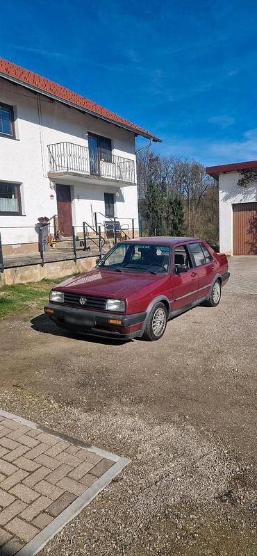 Second-hand VW Jetta 90 CP (66 kW) 1990 Roșu Berlinǎ