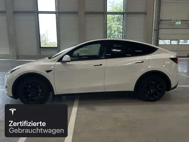 Gebraucht Tesla Model Y RWD 203 kW (277 PS) 2024 Pearl white multicoat SUV