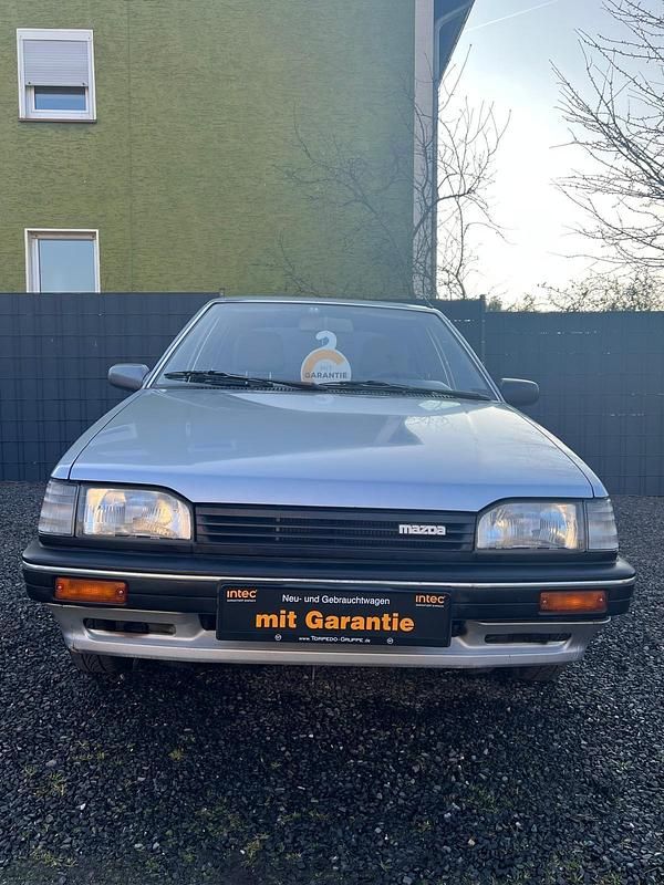 Gebraucht Mazda 323 60 PS (44 kW) 1989 Silber Kleinwagen
