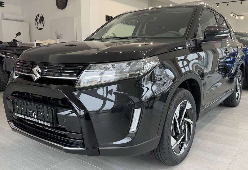 Sphere blue / cosmic black m Gebraucht 2024 Suzuki Vitara Comfort+ SUV | 21.900 € (Fairer Preis) - Bild 1/4