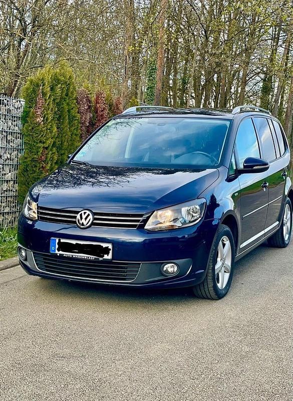 Second-hand VW Touran 140 CP (102 kW) 2013 Albastru Monovolum