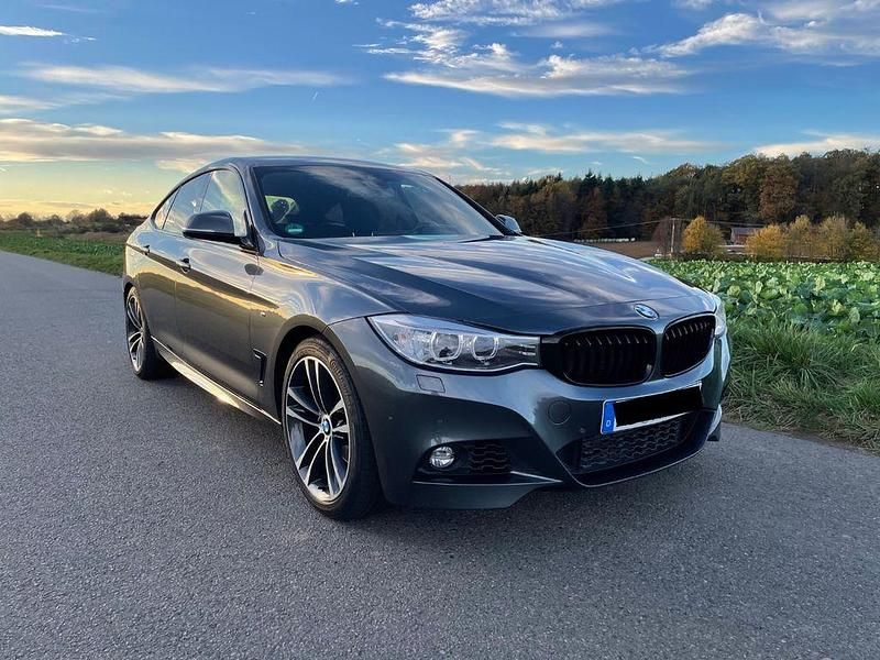 Grau Gebraucht 2013 BMW 320 Gran Turismo Sport Line Limousine | 15.900 € (Teuer) - Bild 1/4