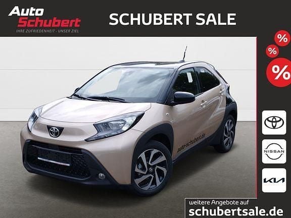 Gebraucht Toyota Aygo X Comfort 72 PS (52 kW) 2024 Ginger beige metallic/ night sky black SUV