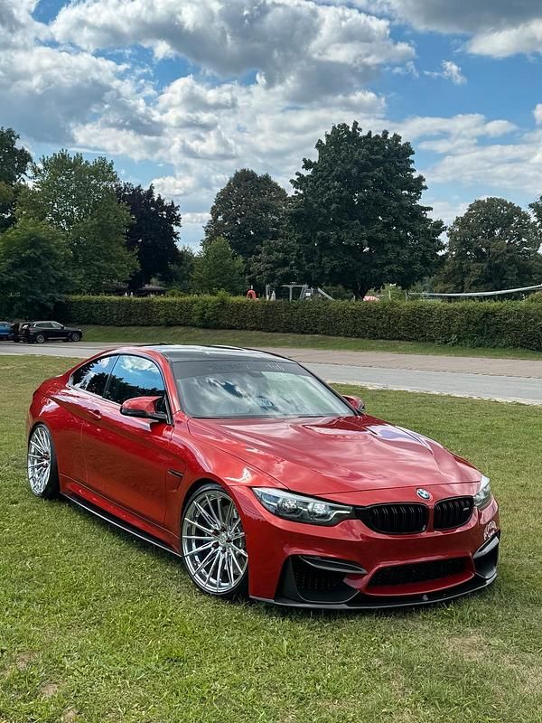 Orange Gebraucht 2017 BMW M4 Sport Line Coupé | 54.500 € (Teuer) - Bild 1/4