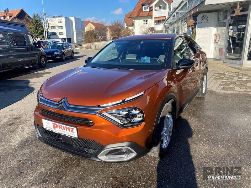 Braun Gebraucht 2022 Citroën e-C4 Shine Limousine | 17.680 € (Fairer Preis) - Bild 1/4