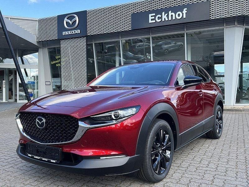 Soul red crystal m Gebraucht 2024 Mazda CX-30 Homura-Line SUV | 29.880 € - Bild 1/4