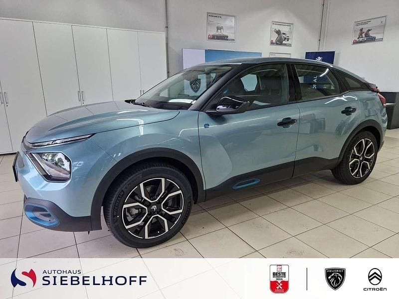 Island blau Gebraucht 2023 Citroën e-C4 Shine Limousine | 20.990 € (Guter Preis) - Bild 1/4