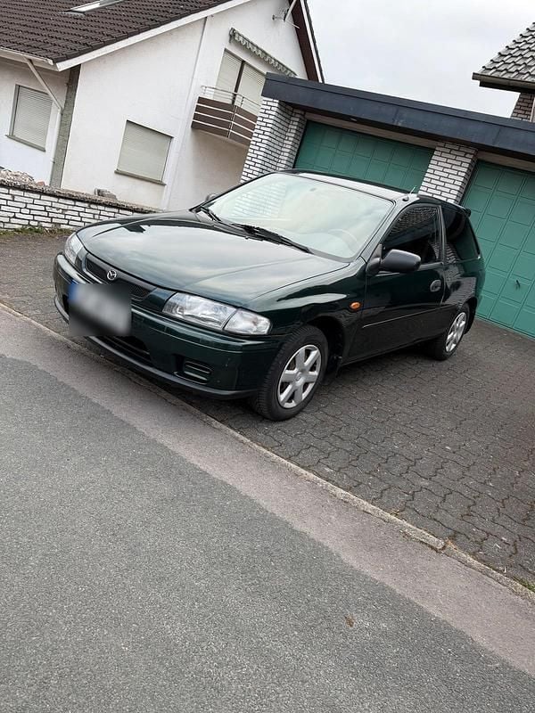 Gebraucht Mazda 323 88 PS (64 kW) 1999 Grün Kleinwagen