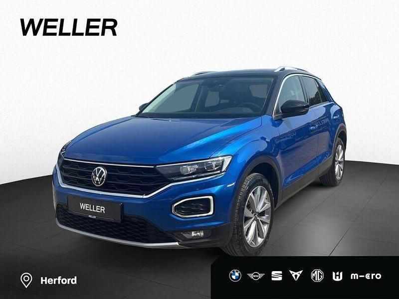 Ravennablau (blau) Gebraucht 2021 VW T-Roc Style SUV | 20.590 € (Guter Preis) - Bild 1/4