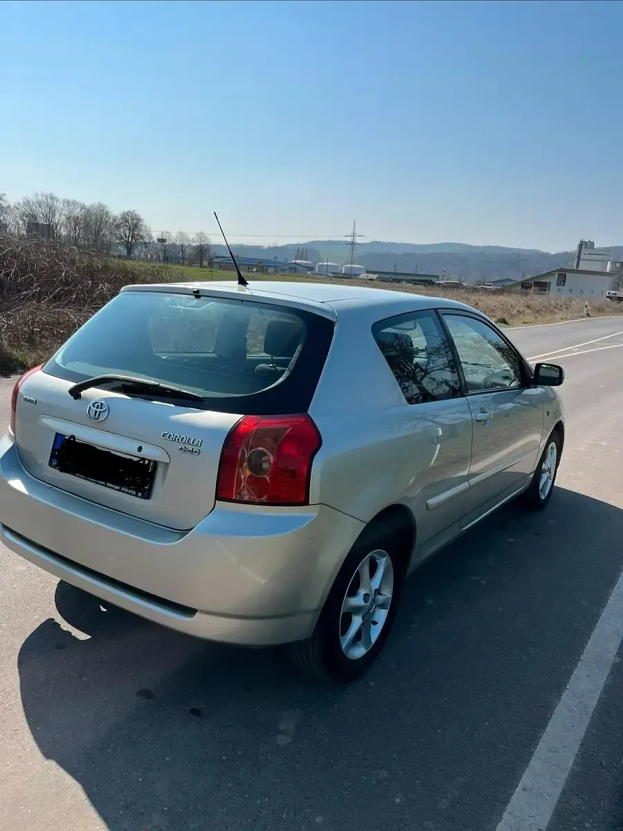 Używany Toyota Corolla 116 KM (85 kW) 2004 Srebrny Coupe