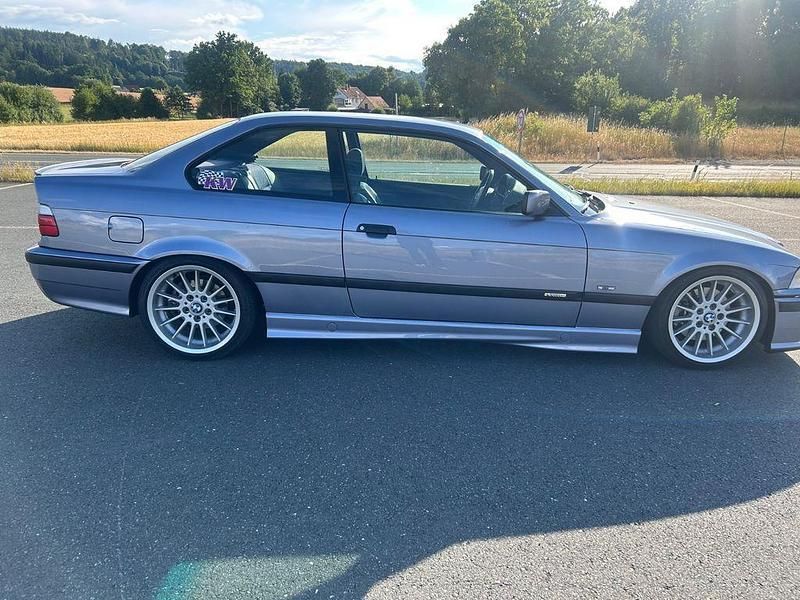 Violet Gebraucht 1997 BMW 323 Performance Coupé | 11.500 € (Fairer Preis) - Bild 1/4