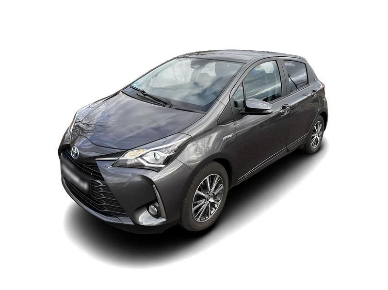 Grau Gebraucht 2019 Toyota Yaris Hybrid Club Limousine | 20.288 € (Teuer) - Bild 1/4
