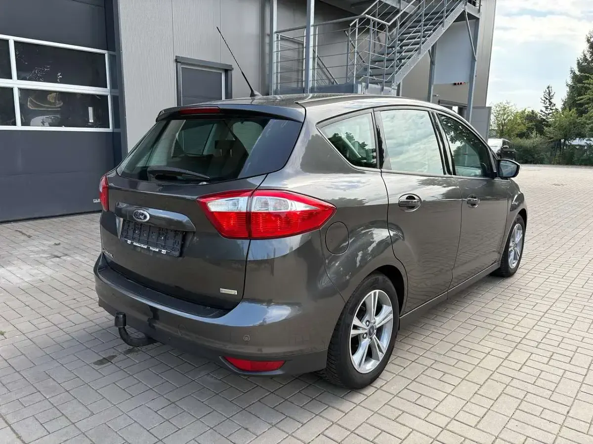 Gebraucht Ford C-MAX Trend 125 PS (91 kW) 2014 Braun Van / Kleinbus