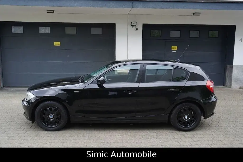 Second-hand BMW 116 122 CP (89 kW) 2011 Negru Hatchback