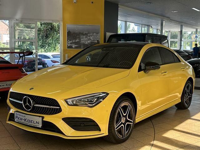 Sonnengelb Gebraucht 2023 Mercedes CLA250e AMG line Limousine | 33.950 € (Fairer Preis) - Bild 1/4