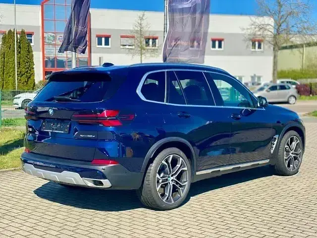 Gebraucht BMW X5 Sport Line 489 PS (359 kW) 2024 Blau SUV
