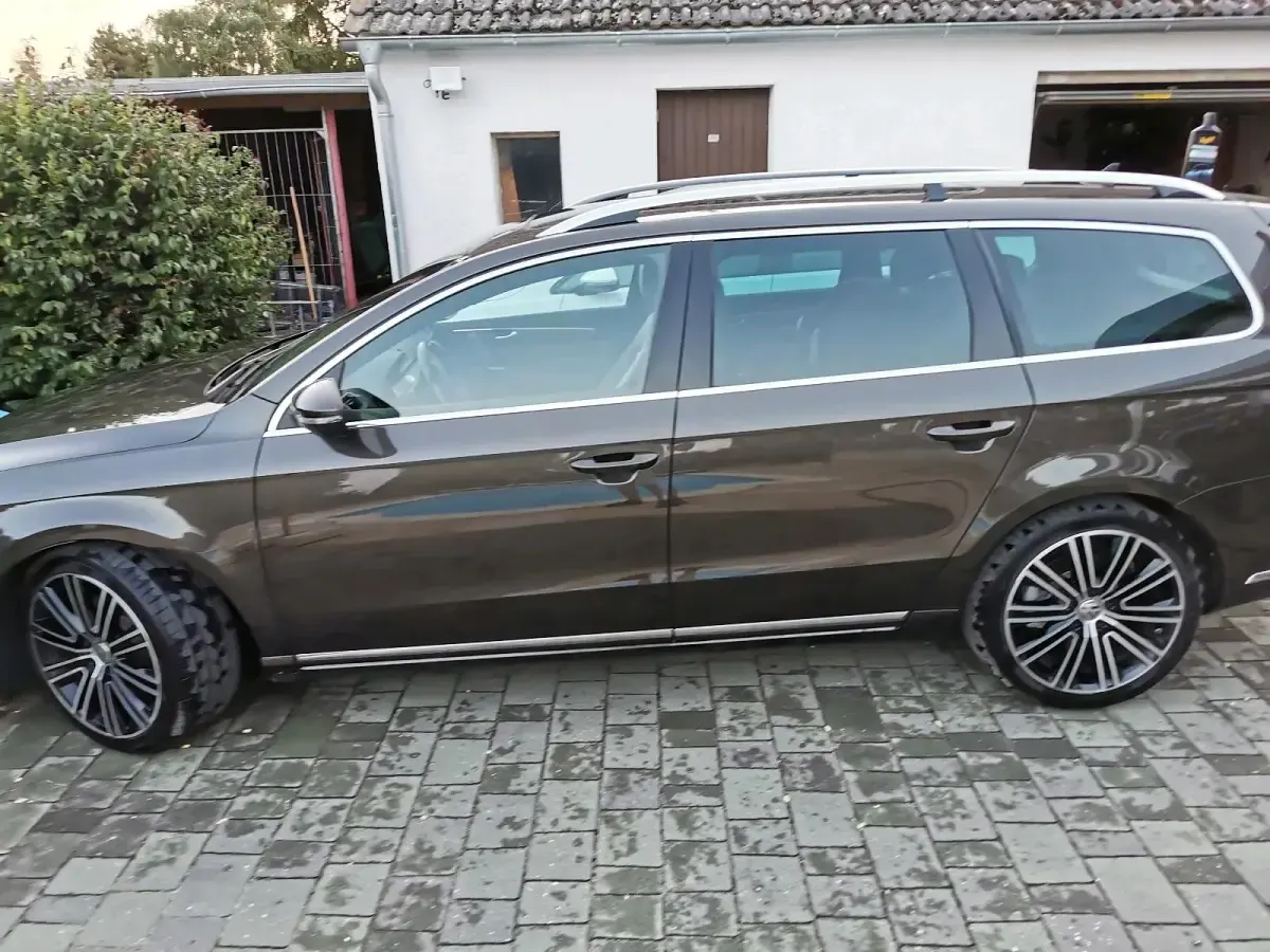 Używany VW Passat Exclusive 177 KM (130 kW) 2014 Brązowy Kombi
