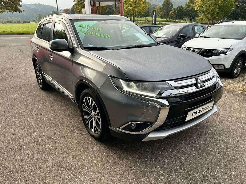 Platinumgrau (m) Gebraucht 2016 Mitsubishi Outlander Top SUV | 15.800 € (Fairer Preis) - Bild 1/4