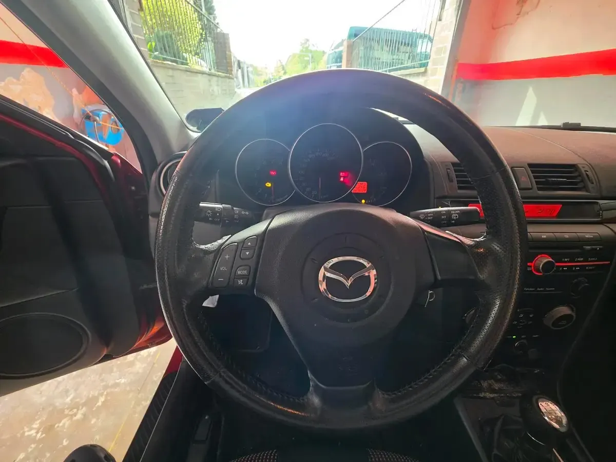 Second-hand Mazda 3 105 CP (77 kW) 2006 Roșu Berlinǎ