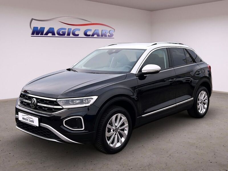 Deep black perleffekt (metallic) Gebraucht 2023 VW T-Roc Style SUV | 29.790 € (Fairer Preis) - Bild 1/4