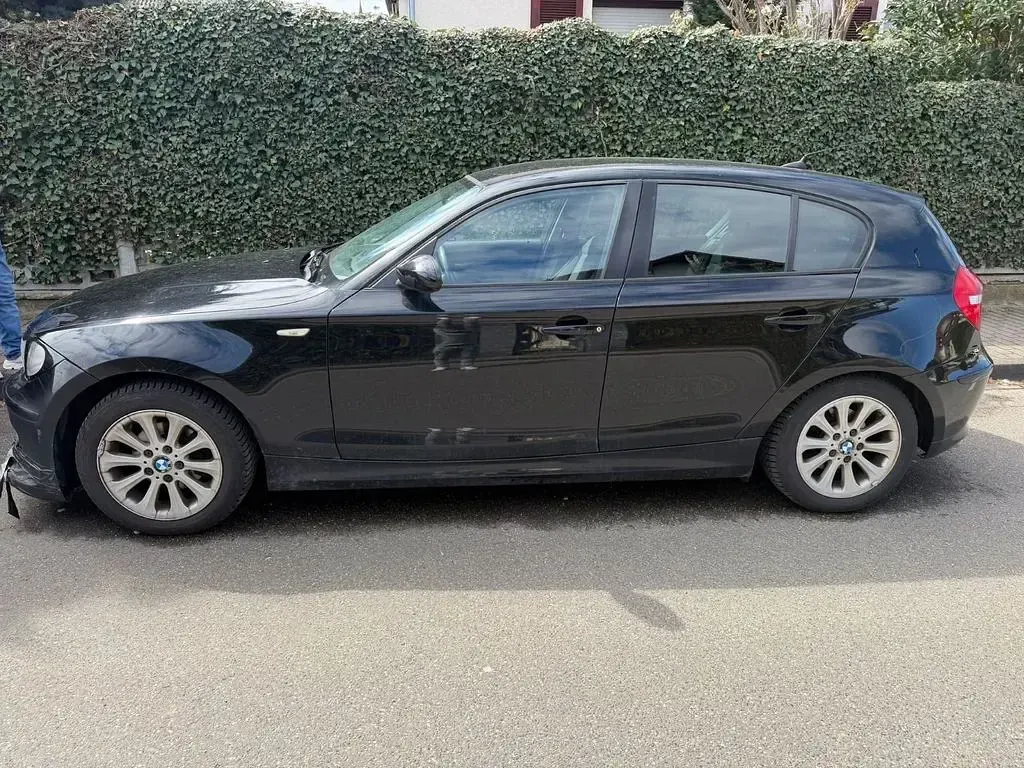 Second-hand BMW 116 122 CP (89 kW) 2009 Negru Hatchback