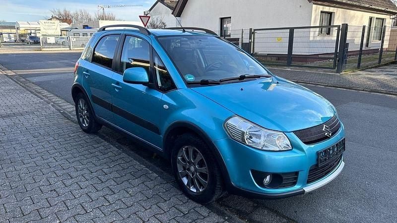 Blau Gebraucht 2010 Suzuki SX4 Comfort SUV | 7.890 € (Fairer Preis) - Bild 1/4