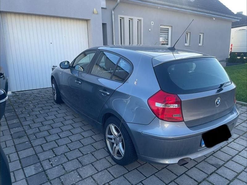 Second-hand BMW 116 122 CP (89 kW) 2009 Argintiu Hatchback
