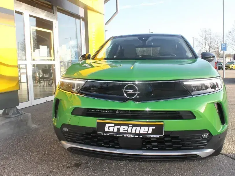 Gebraucht Opel Mokka Elegance 131 PS (96 kW) 2023 Matcha grün (metallic) SUV