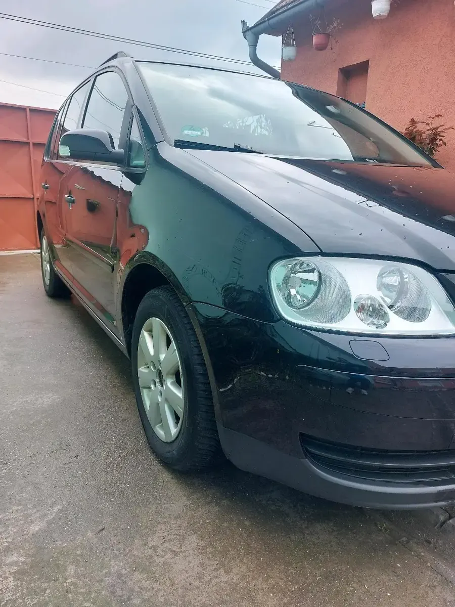 Używany VW Touran 105 KM (77 kW) 2006 Czarny Minivan