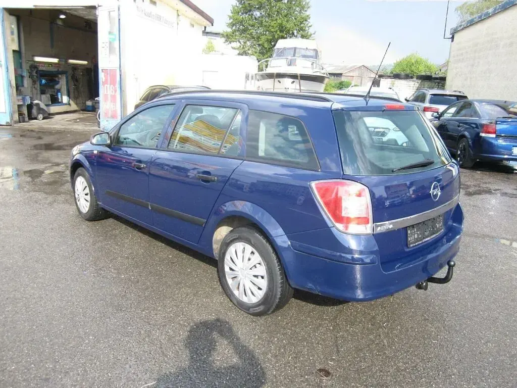 Gebraucht Opel Astra Selection 116 PS (85 kW) 2009 Royalblau h: u2/f:atlantikblau Kombi