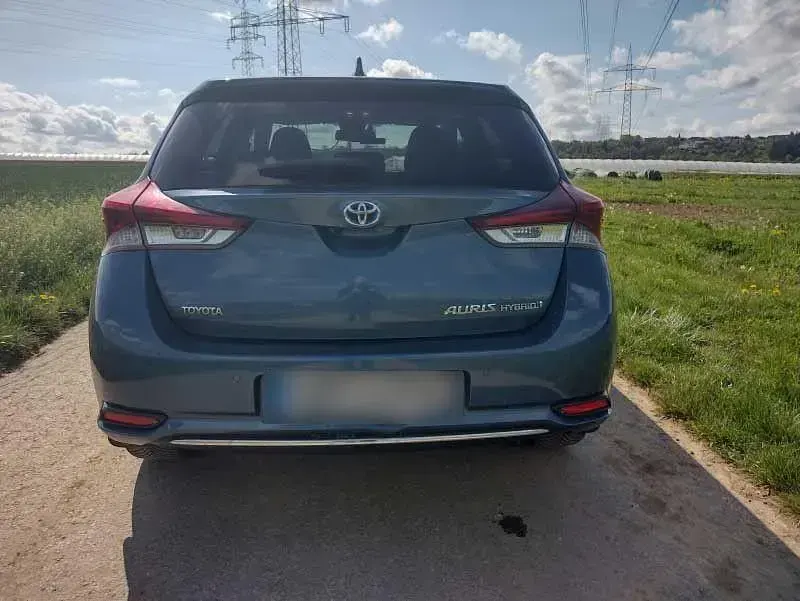 Gebraucht Toyota Auris Hybrid 136 PS (100 kW) 2016 Blau Limousine