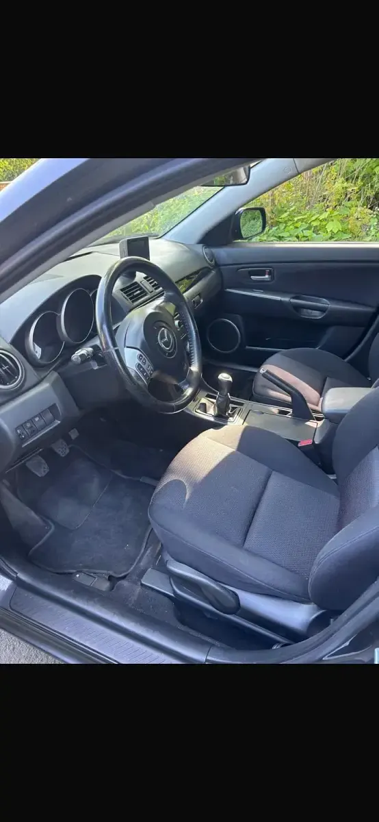 Używany Mazda 3 109 KM (80 kW) 2007 Szary Hatchback