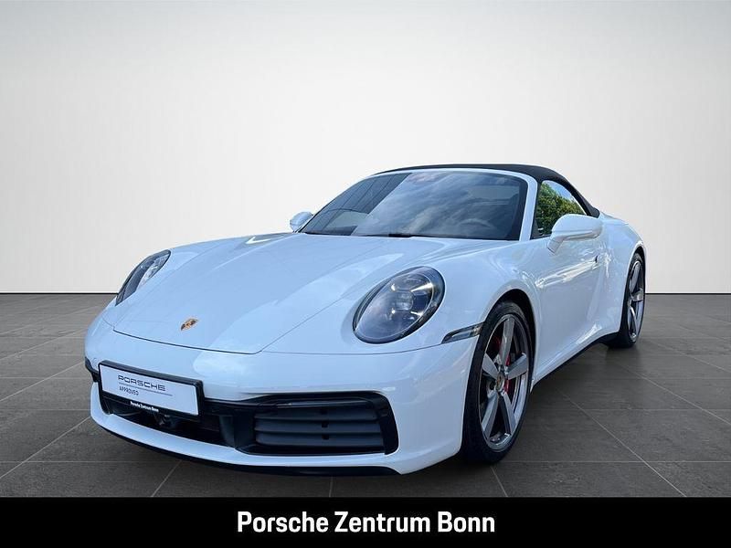 Weiss Gebraucht 2024 Porsche 911 Carrera 4S Cabriolet Cabrio | 163.911 € (Teuer) - Bild 1/4