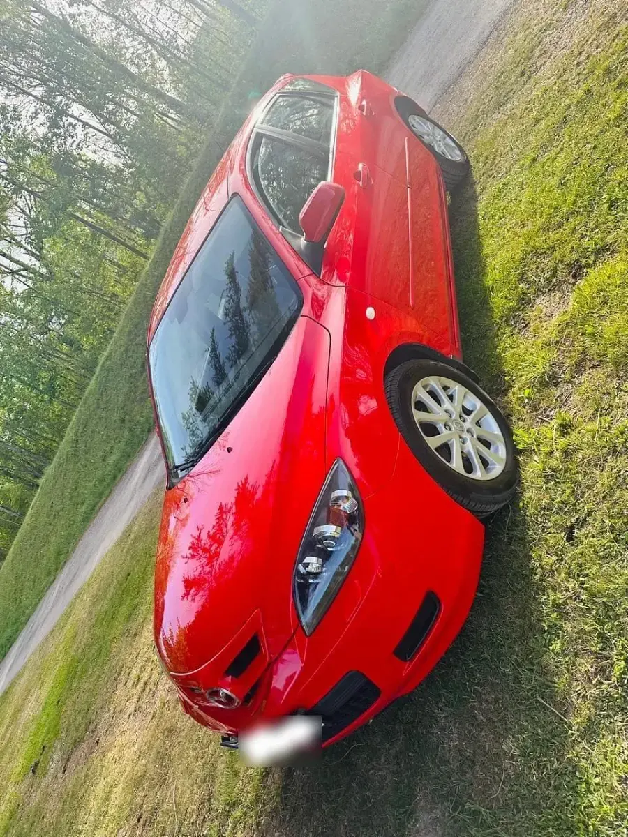 Używany Mazda 3 105 KM (77 kW) 2009 Czerwony Hatchback