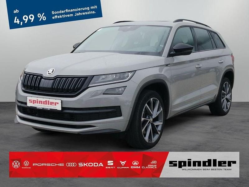 Steelgrau Gebraucht 2021 Skoda Kodiaq SportLine SUV | 38.280 € (Teuer) - Bild 1/4