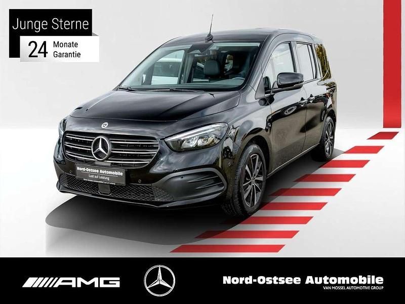 Loparitschwarz metallic Gebraucht 2022 Mercedes T180 Progressive Van / Kleinbus | 26.990 € (Fairer Preis) - Bild 1/4