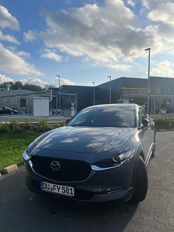 Grau Gebraucht 2024 Mazda CX-30 Selection SUV | 22.700 € (Guter Preis) - Bild 1/4