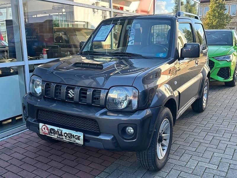 Grau Gebraucht 2015 Suzuki Jimny Ranger Style SUV | 18.999 € (Teuer) - Bild 1/4