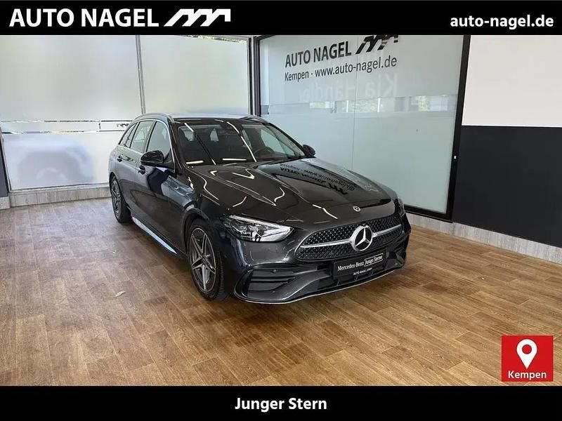 Grau Gebraucht 2021 Mercedes C200 AMG Kombi | 33.876 € (Teuer) - Bild 1/4