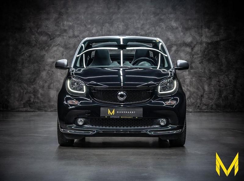 Tiefschwarz Gebraucht 2018 Smart ForTwo Cabrio Brabus Xclusive Cabrio | 35.222 € - Bild 1/4