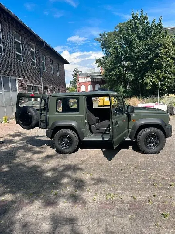 Gebraucht Suzuki Jimny Comfort 102 PS (75 kW) 2023 Grün SUV