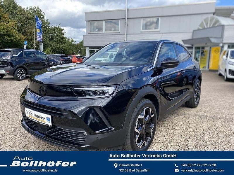 Karbon schwarz Gebraucht 2024 Opel Mokka Ultimate SUV | 22.577 € (Fairer Preis) - Bild 1/4